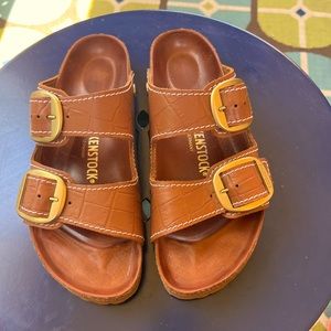 Big Buckle Arizona Sandals from Birkenstock + Staud in croc-embossed leather